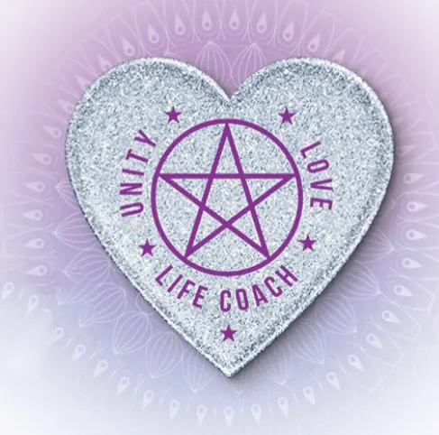 A heart shaped patch with the words " unity life coach love " and a pentagram.